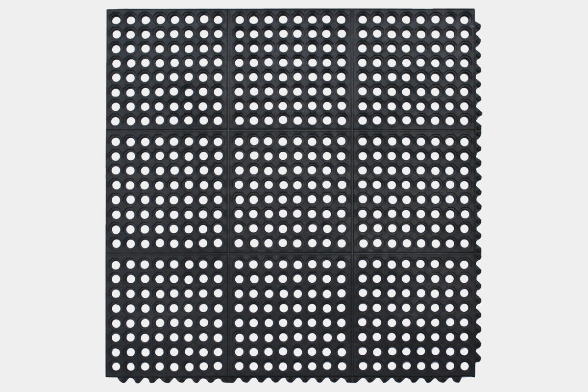 Perforated interlocking rubber mat tiles
